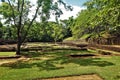 The ruins of the amazing Sigiriya fortress in Sri Lanka. The ancient stone walls, foundations, stairs Royalty Free Stock Photo