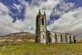 Ruins of ancient abandoned church with graveyard in Ireland