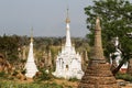 Ruins of ancient Burmese Buddhist pagodas Nyaung Ohak in the village of Indein on Inlay Lake in Shan State Royalty Free Stock Photo