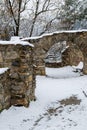 The ruins of an ancient castle covered with white snow