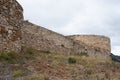 Ruins of an ancient castle at Merindades, Burgos, Spain. Stone walls and grass around. Royalty Free Stock Photo