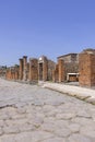 Ruins of an ancient city destroyed by the eruption of the volcano Vesuvius near Naples, Pompeii, Italy. View of one of the city Royalty Free Stock Photo