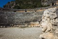 Ruins of the ancient city of Myra in Demre, Turkey, Stone faces bas relief and amphitheater at Myra ancient Royalty Free Stock Photo