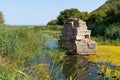 The ruins in ancient city Olimpos, and Mediterranean sea in background in Antalya/Turkey Royalty Free Stock Photo