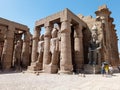 Ruins of an ancient egyptian temple with columns full of hieroglyphs in Egypt Royalty Free Stock Photo