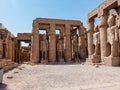 Ruins of an ancient egyptian temple with columns full of hieroglyphs in Egypt Royalty Free Stock Photo