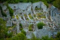 ruins of an ancient fortress in the green mountains. Royalty Free Stock Photo