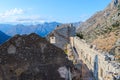 Ruins of ancient fortress of St. John Illyrian Fort over city of Kotor, Montenegro Royalty Free Stock Photo