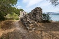 Ruins of an ancient fortress wall are located in the Butrint National Park in Buthrotum, Albania Royalty Free Stock Photo