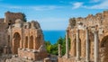 Ruins of the Ancient Greek Theater in Taormina with the sea in the background. Province of Messina, Sicily, southern Italy. Royalty Free Stock Photo