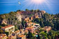 Ruins of Ancient Greek theater in Taormina, Sicily, Italy. Taormina located in Metropolitan City of Messina, on east coast of Royalty Free Stock Photo