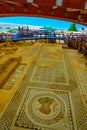 Ruins of an ancient house with beautiful floor mosaics in ancient Kourion, Cyprus