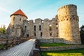 The ruins of ancient Livonian castle in the old town of Cesis in Latvia during a warm sunset Royalty Free Stock Photo