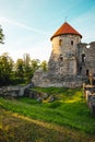 The ruins of ancient Livonian castle in the old town of Cesis in Latvia during a warm sunset Royalty Free Stock Photo