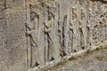 Stone bas-relief with warriors in ancient city Persepolis, Iran. Royalty Free Stock Photo