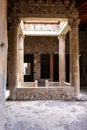 Ruins of an ancient Roman house in Pompeii destroyed by the eruption of Vesuvius in 79 BC, Italy Royalty Free Stock Photo