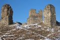 Ruins of the ancient stone castle in winter. Royalty Free Stock Photo