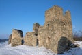 Ruins of the ancient stone castle in winter. Royalty Free Stock Photo