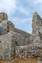 Ruins of ancient stone walls close-up, vertical
