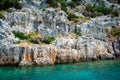 Ruins of the ancient sunken Lycian underwater city of Dolichiste on the island of Kekova. Attraction of the Royalty Free Stock Photo