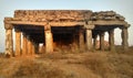 Ruins of an ancient temple at sunset at Hemakuta hill in Hampi, Karnataka, India Royalty Free Stock Photo