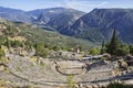 Ruins of the ancient theatre and Temple of Apollo at Delphi, Greece Royalty Free Stock Photo