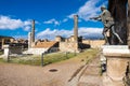 Ruins of the antique Temple of Apollo with bronze Apollo statue in Pompeii Royalty Free Stock Photo