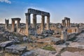 Ruins of Appollo temple with fortress at back in ancient Corinth, Peloponnese, Greece Royalty Free Stock Photo
