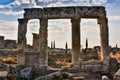 Ruins of Appollo temple with fortress at back in ancient Corinth, Peloponnese, Greece Royalty Free Stock Photo
