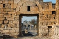 Ruins of Appollo temple with fortress at back in ancient Corinth, Peloponnese, Greece Royalty Free Stock Photo