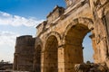 Ruins of Appollo temple with fortress at back in ancient Corinth, Peloponnese, Greece Royalty Free Stock Photo