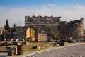 Ruins of Appollo temple with fortress at back in ancient Corinth, Peloponnese, Greece Royalty Free Stock Photo