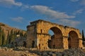 Ruins of Appollo temple with fortress at back in ancient Corinth, Peloponnese, Greece Royalty Free Stock Photo