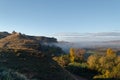 Ruins of the Arab castle in Maria de Huerva near Zaragoza early in the morning with mist in the valley