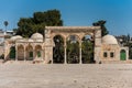 Ruins arched north gateway and Islamic buildings at the square of Golden Dome of the Rock, in an Islamic shrine located on the