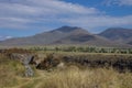 Ruins of the Armenian medieval fortress Lori Berd near Stepanavan with mountains at background, Armenia Royalty Free Stock Photo