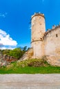 Ruins of Boskovice castle - view of surrounding walls and tower. Summer day, blue sky. Tourism in the Czech Republic - ancient