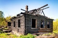 Ruins of a burned down old wooden hut Royalty Free Stock Photo