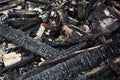 Ruins of a burned wooden house