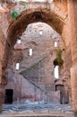 Ruins in Caracalla springs with windows big arc and staircase at