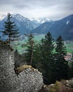 Ruins of the castle Hohenwaldeck with the Bavarian Alps landscape on background, Schliersee, Bavaria, Germany, April 2019 Royalty Free Stock Photo