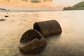 The ruins Cement pipe on the sea in sunset time.Beautiful seascape.Thailand