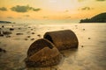 The ruins Cement pipe on the sea in sunset time.Beautiful seascape.Thailand