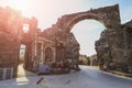 The ruins of the central gate of the ancient city of Side in Turkey in the light of the setting sun Royalty Free Stock Photo