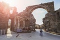 The ruins of the central gate of the ancient city of Side in Turkey in the light of the setting sun Royalty Free Stock Photo