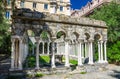 Ruins of Chiostro di Sant`Andrea monastery with columns and green plants around Royalty Free Stock Photo