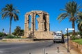 Ruins of the Church of St. George of the Latins between two palm trees Royalty Free Stock Photo