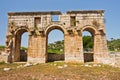 Ruins of city gate near the road to arheological site of ancient Lycian city of Patara Royalty Free Stock Photo