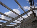 Building ruins, destroyed roof, sky through the roof