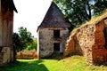 Ruins. Courtyard of the fortified medieval saxon evangelic church in the village Felmer, Felmern, Transylvania, Romania. Royalty Free Stock Photo